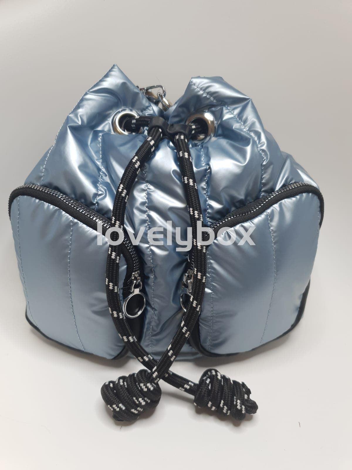 Bolso acolchado metalizado azul claro cordón - Imagen 1