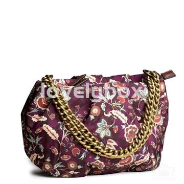 Bolso tipo canastita con asa de cadena y estampado de flores antik batik burdeos tantrend - Imagen 1